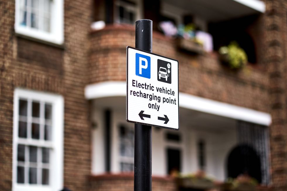 An electric car charging sign