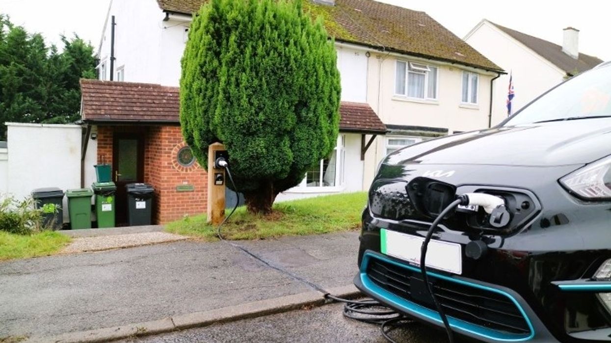 An electric car charging with a Kerbo Charge