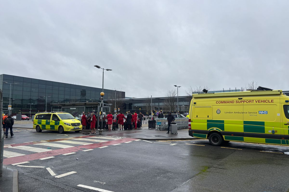 An emergency vehicle outside Heathrow Terminal 3 after a man has been arrested on suspicion of assaul