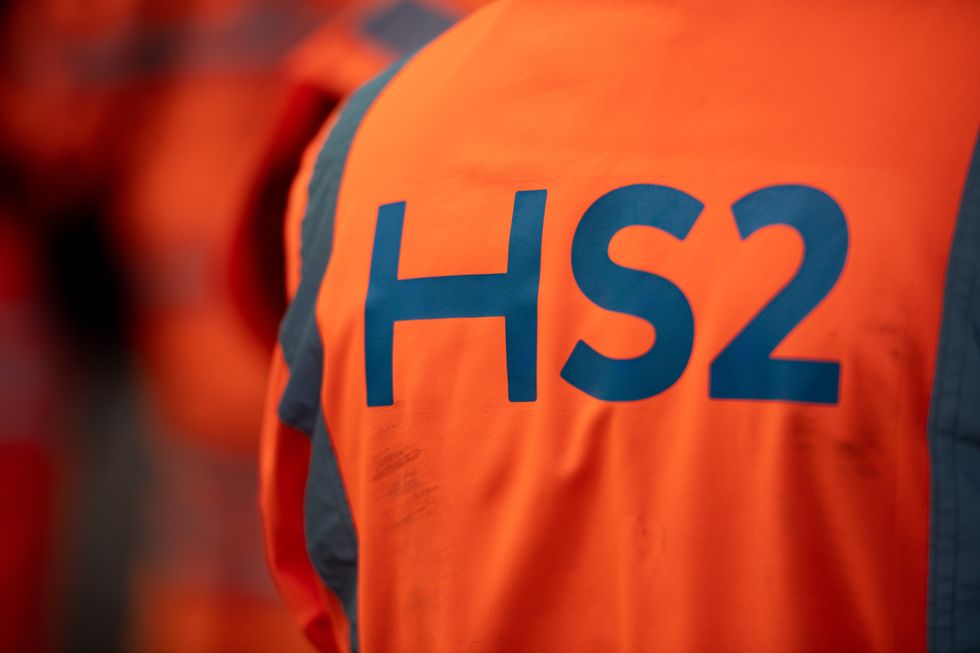 An engineer in a HS2 hi-vis jacket