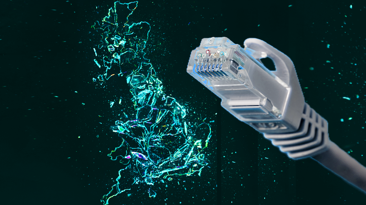 an ethernet cable pictured in the foreground with a map of the UK made in broken glass pictured in the background