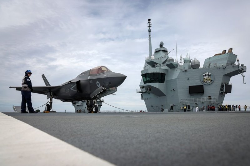 An F-35B fighter jet rests on the deck of HMS Prince of Wales
