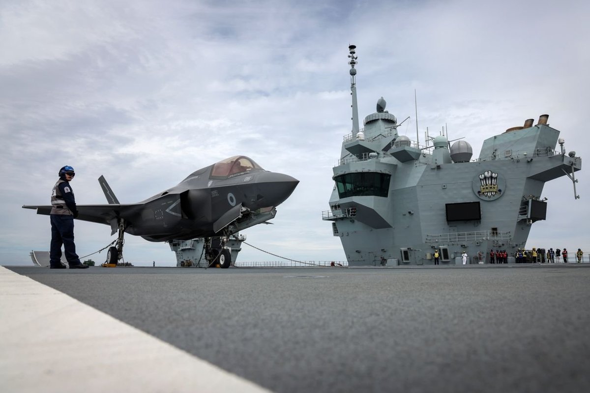 An F-35B fighter jet rests on the deck of HMS Prince of Wales