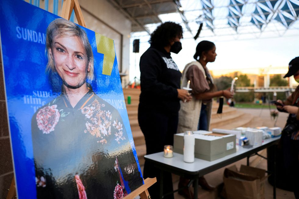 An image of cinematographer Halyna Hutchins, who died after being shot by Alec Baldwin on the set of his movie %22Rust%22, is displayed at a vigil in her honour in Albuquerque, New Mexico, U.S., October 23, 2021.