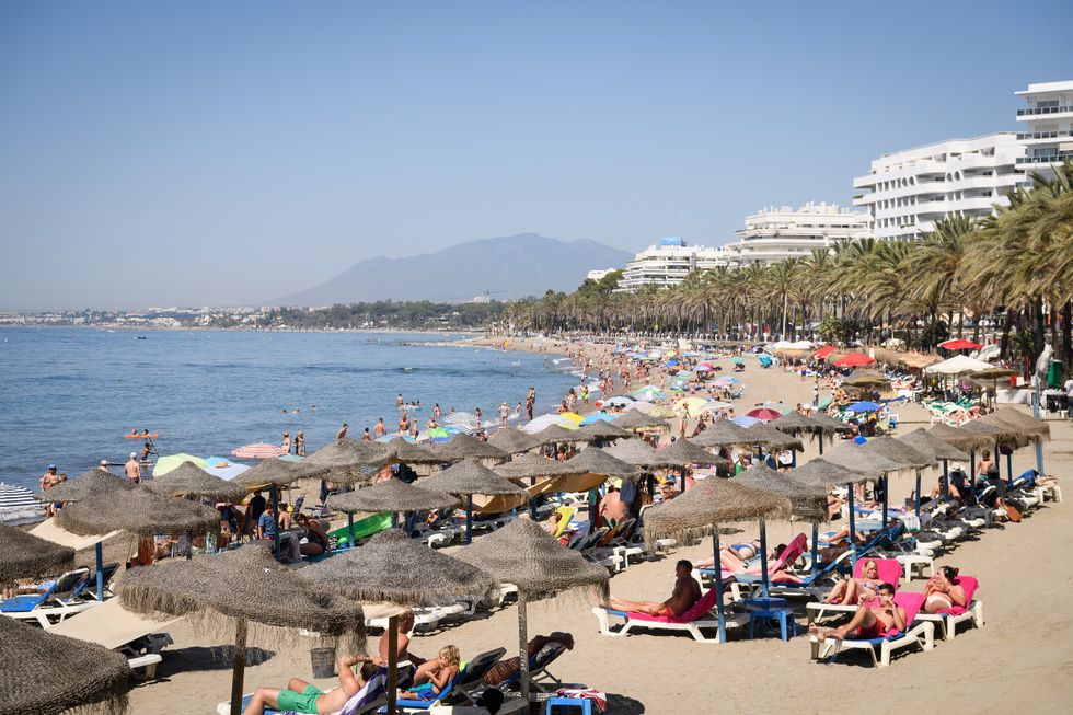 An image of holidaymakers enjoying Marbella's beaches