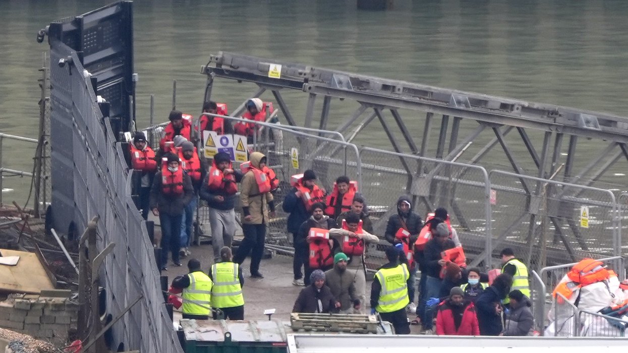 An image of illegal migrants arriving in the UK