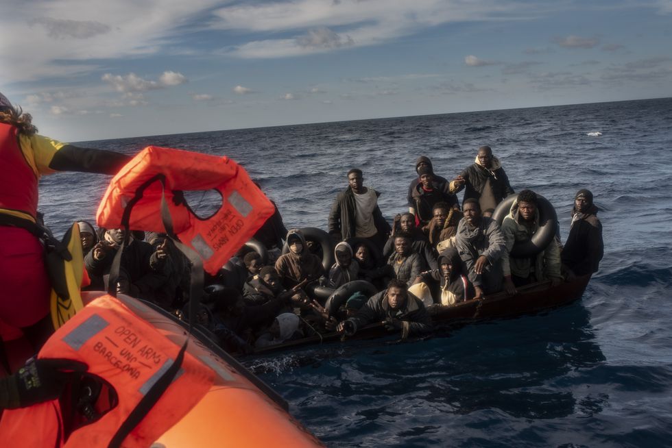 An image of migrants in the Mediterranean Sea