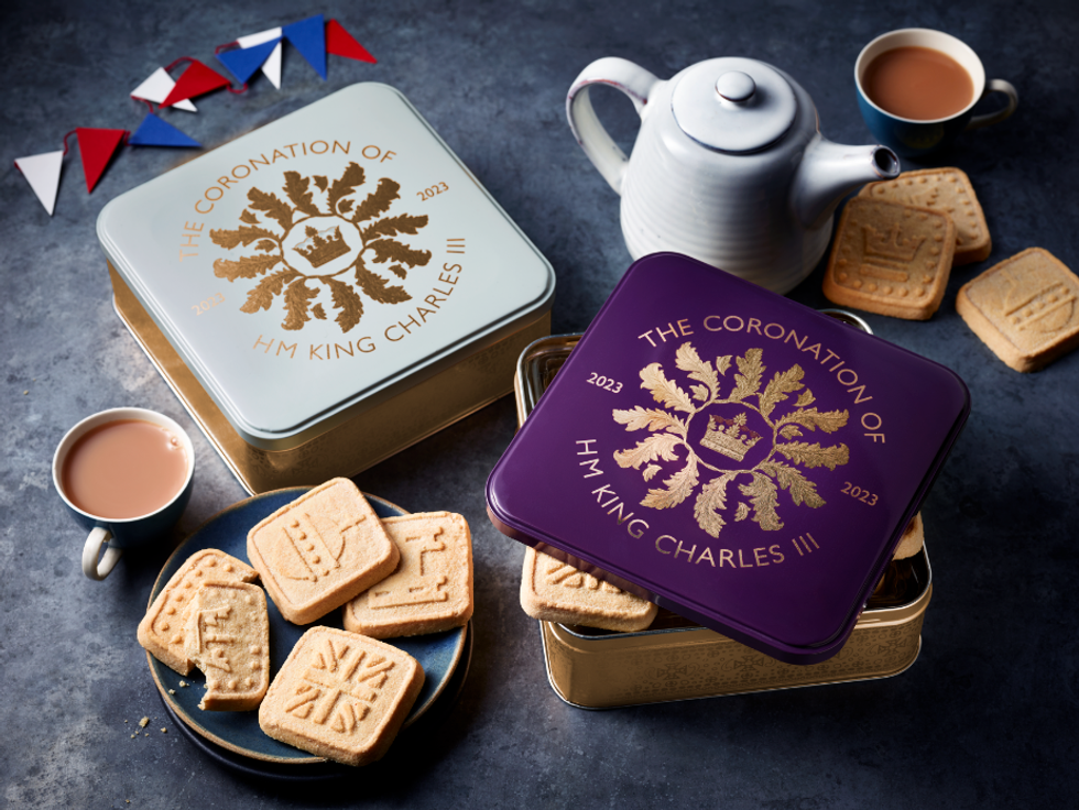 An image of the commemorative biscuit tins available to customers