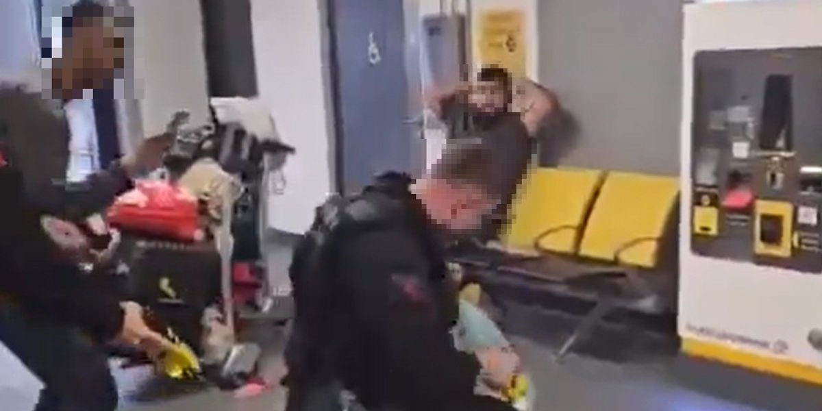 NextImg:Police filmed stamping on suspect's head in shocking footage at Manchester Airport after 'violent assault' leaves three officers in hospital and four men arrested