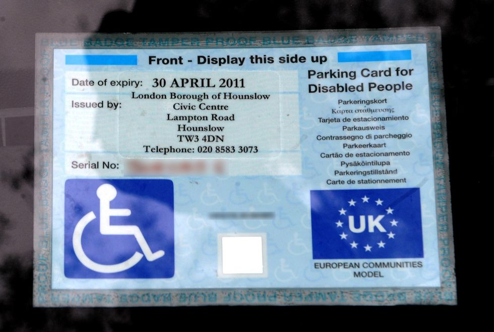 An old Blue Badge parking notice