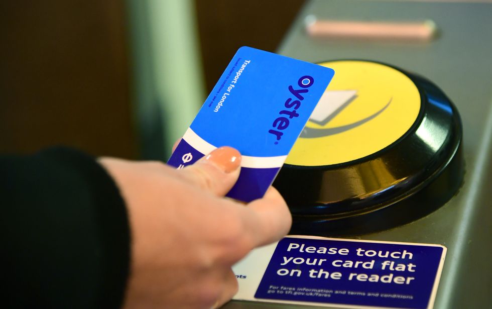 An Oyster card is used at a tube station in London