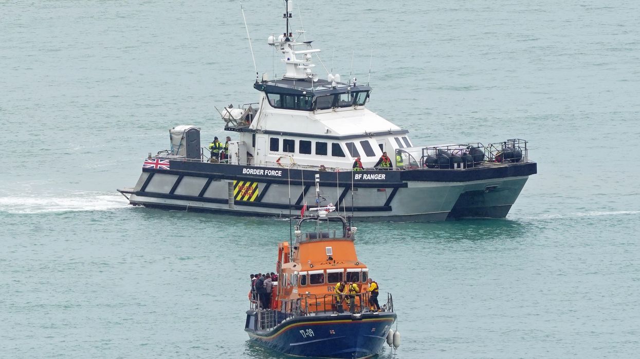 An RNLI Lifeboat and a Border Force vessel