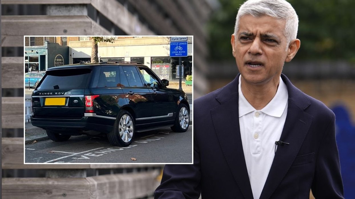 An SUV parked in London and London Mayor Sir Sadiuq