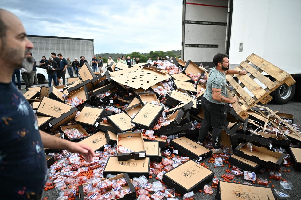 An unloaded spanish tomato truck