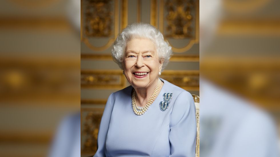 An unseen portrait of Queen Elizabeth II smiling with joy has been released by Buckingham Palace on the eve of her funeral.