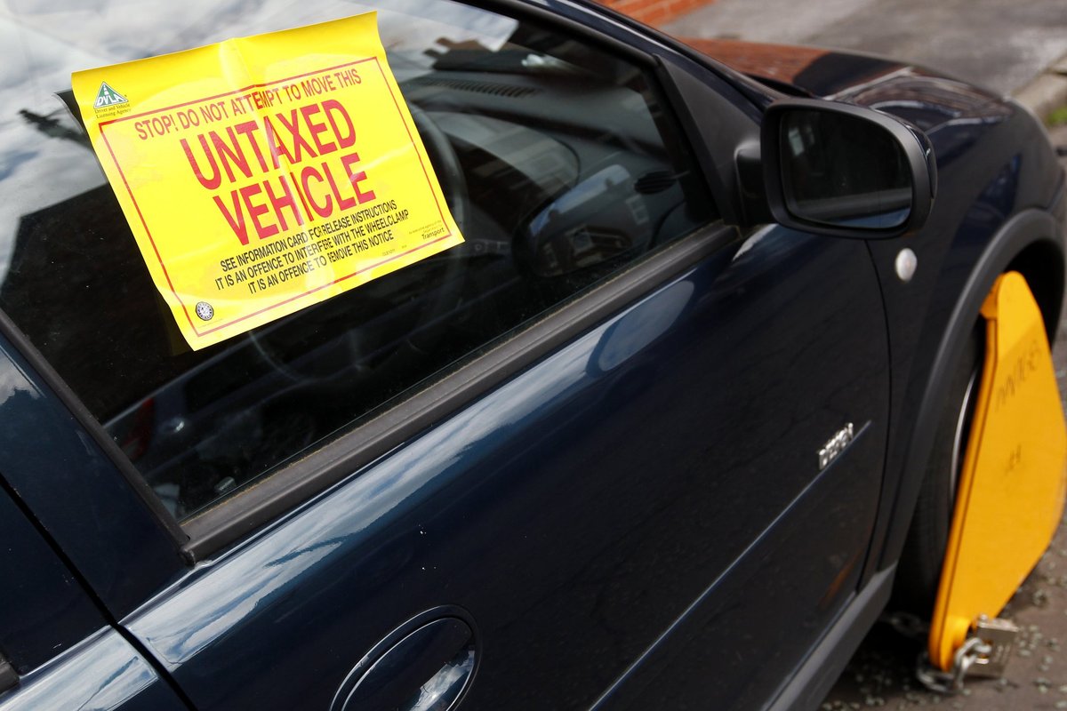 An untaxed vehicle with a DVLA wheel clamp