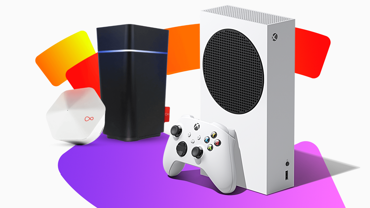 an xbox series s console with a white controller leaning against it with a virgin media router and extender node in the background