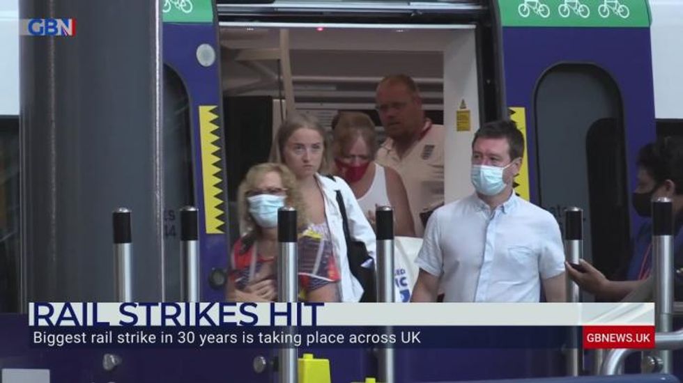 Network Rail chief squirms as he's grilled on £600,000 salary amid train strike chaos