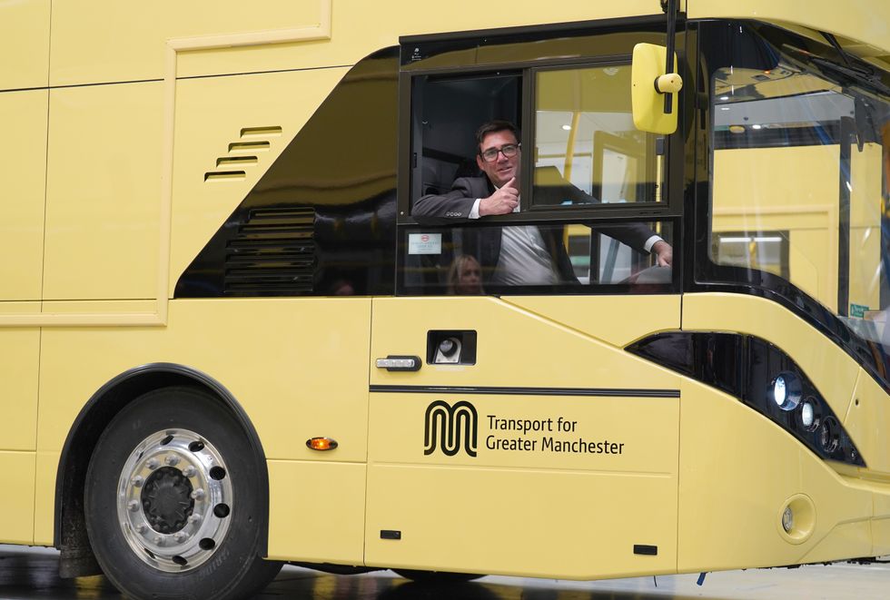 Andy Burnham in a Bee Network bus