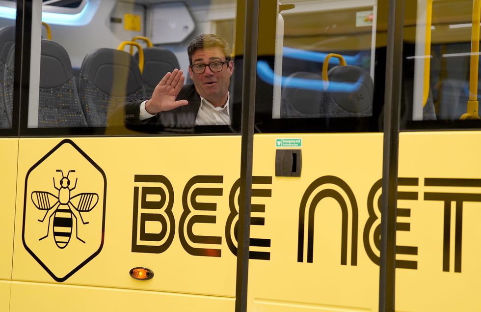 Andy Burnham on the Bee Network bus