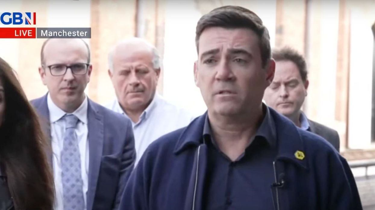 Andy Burnham speaking at a press conference
