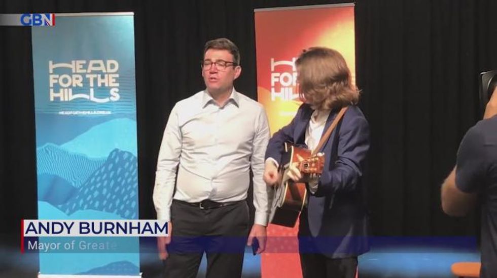 Watch Mayor of Greater Manchester Andy Burnham perform Oasis classic 'Wonderwall'