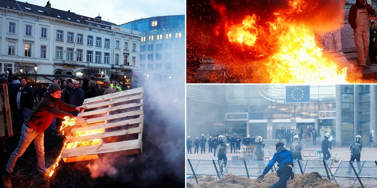 NextImg:Furious farmers light BONFIRE outside EU HQ as fury over Brussels' crippling policies erupts