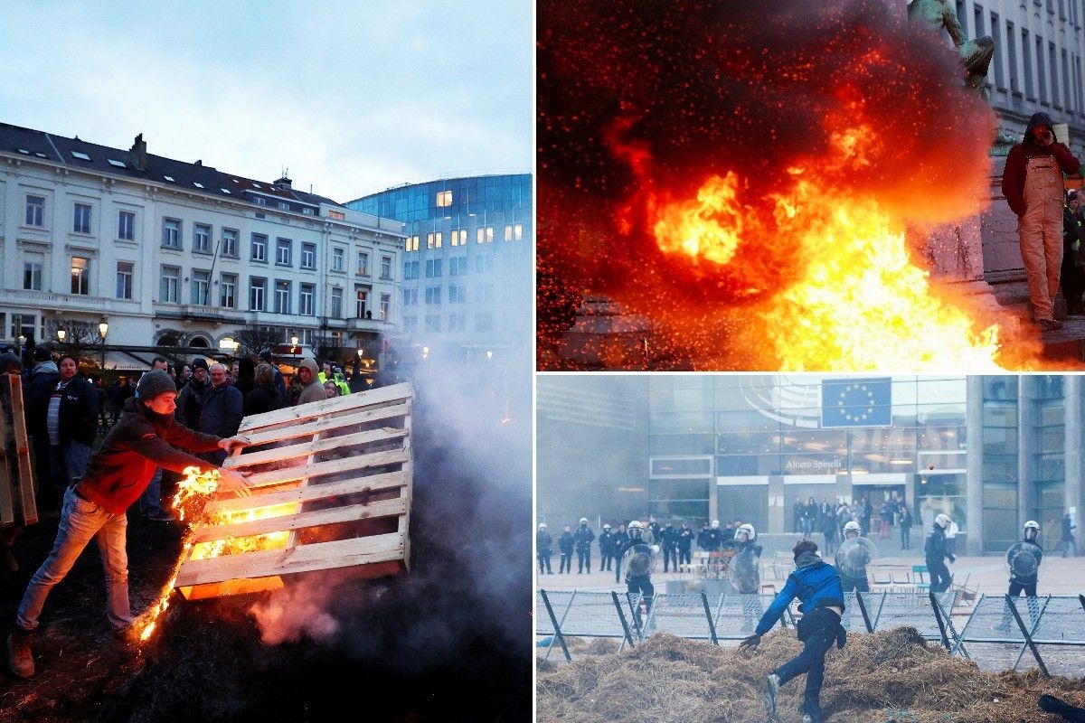 ​Angry farmers have lit a bonfire outside the EU Parliament