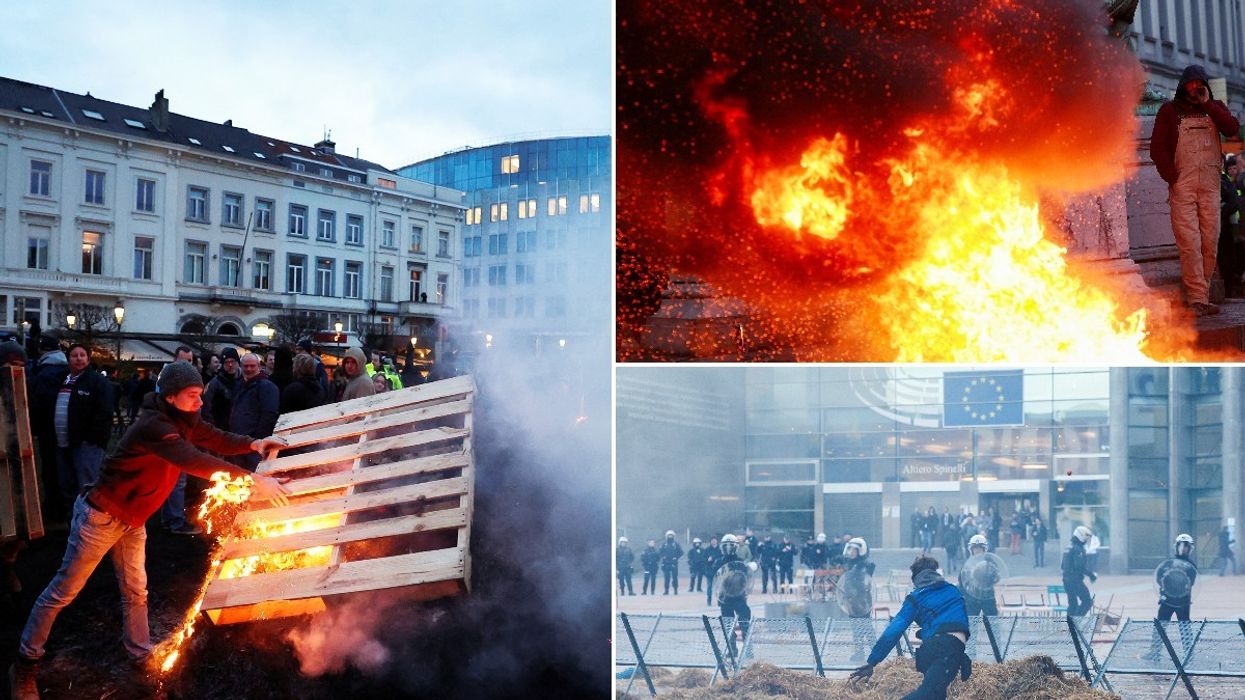 Angry farmers have lit a bonfire outside the EU Parliament