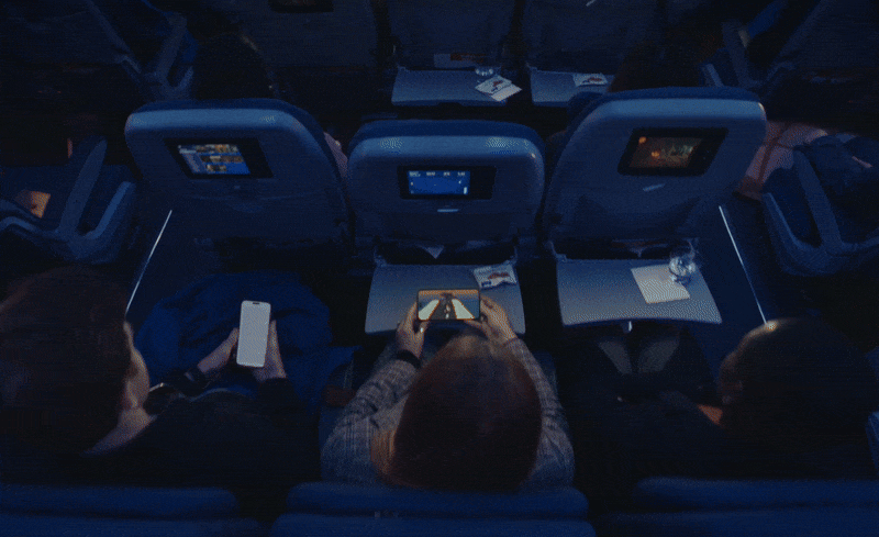 animated gif of a man watching napoleon on a cinema screen in the vision pro