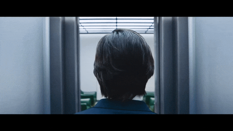 animated gif showing adam scott in the second season of severance on apple tv