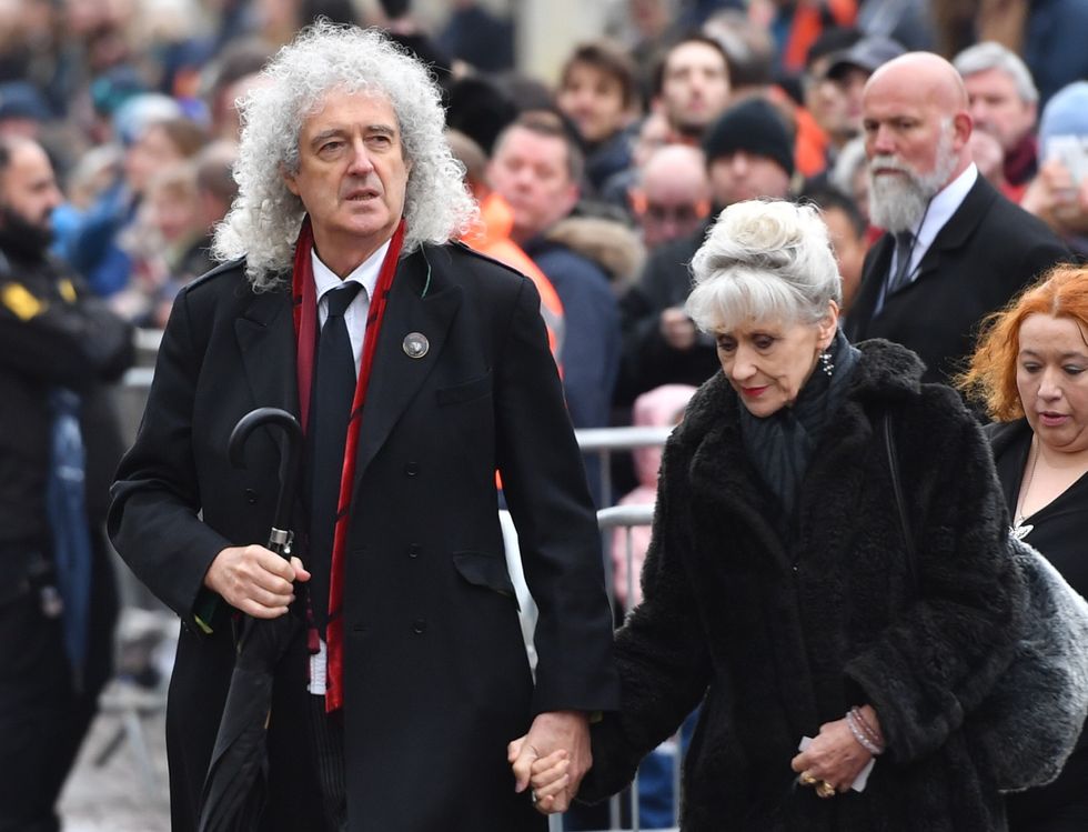 Anita dobson and Brian May