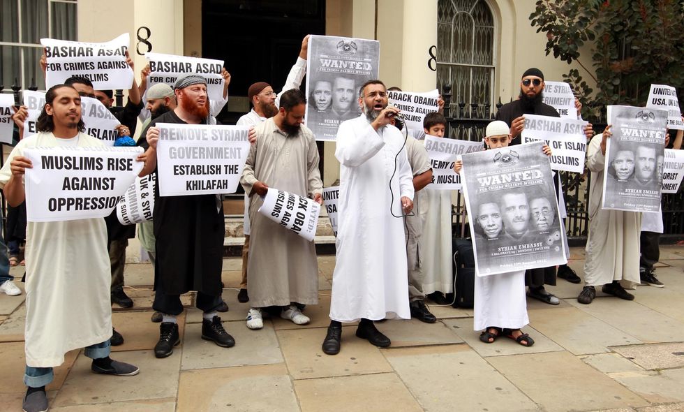 Anjem Choudary (centre) with fellow demonstrators