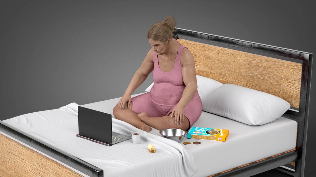 Anna working from bed