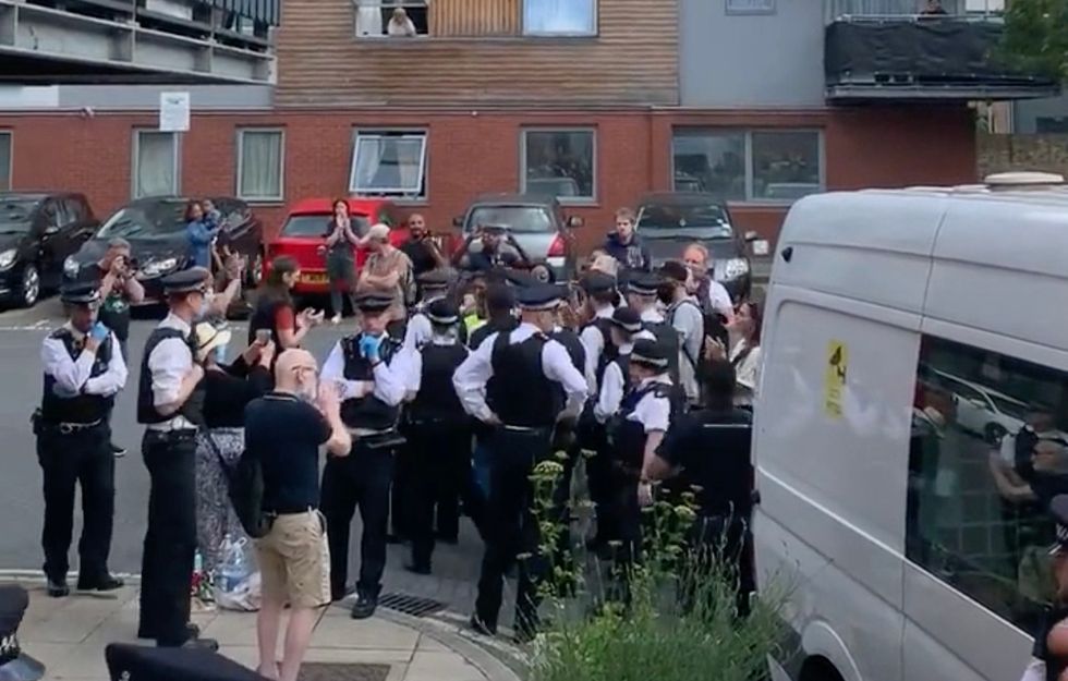 Another clip showed members of the public standing and shouting \u201clet him go\u201d.