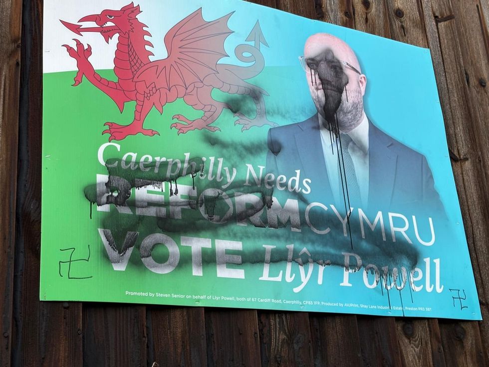 Another Reform UK poster was vandalised to feature swastikas