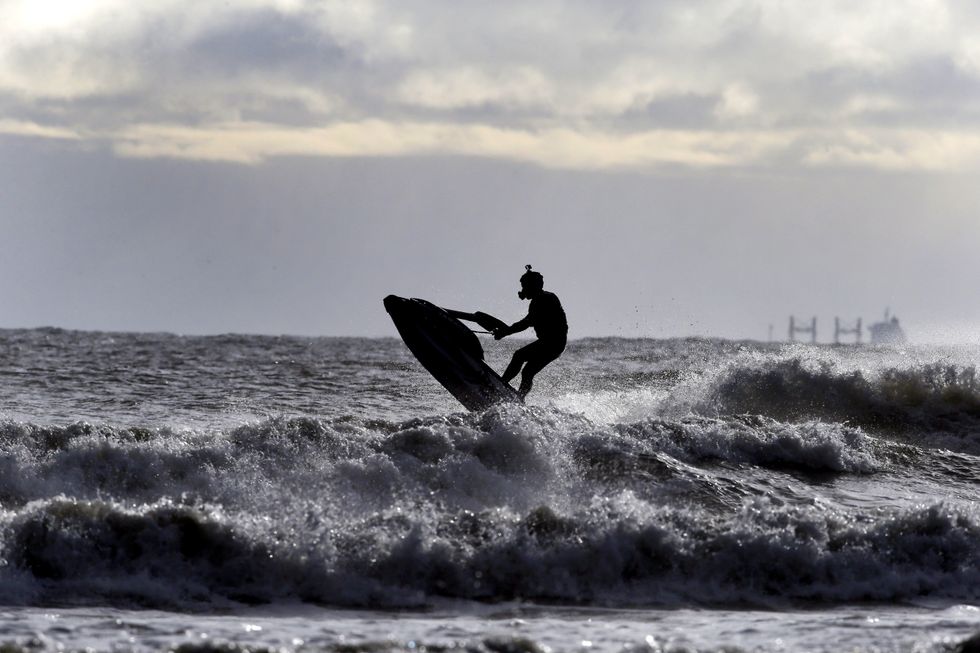 Another stock image of a person riding a jet ski