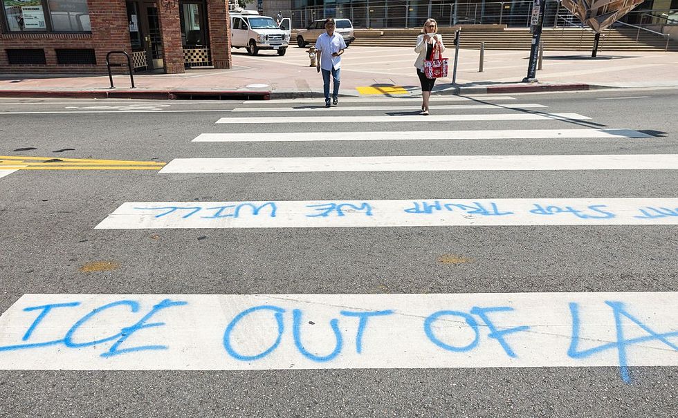 Anti-ICE graffiti on street
