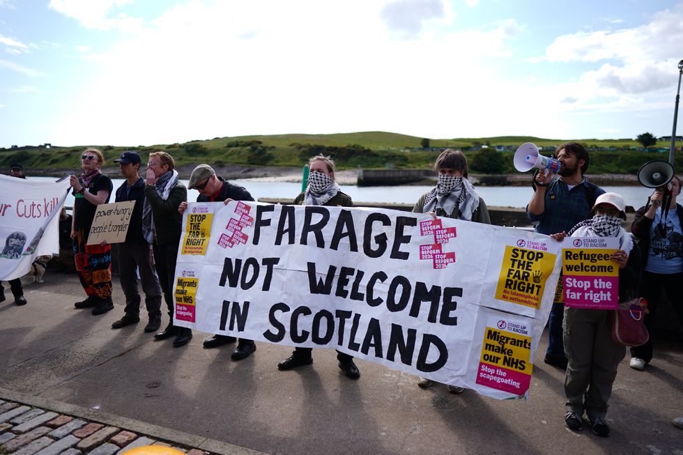 Anti-Reform UK protesters gather in Aberdeen