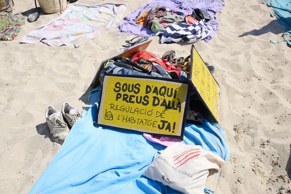 Anti-tourism placard on a Majorca beach