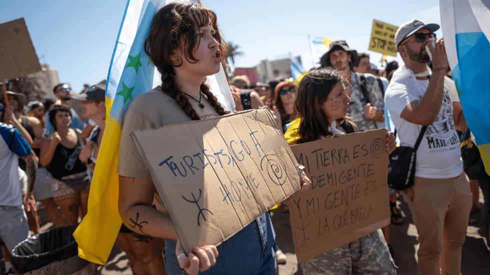 Anti-tourism protestor in Tenerife