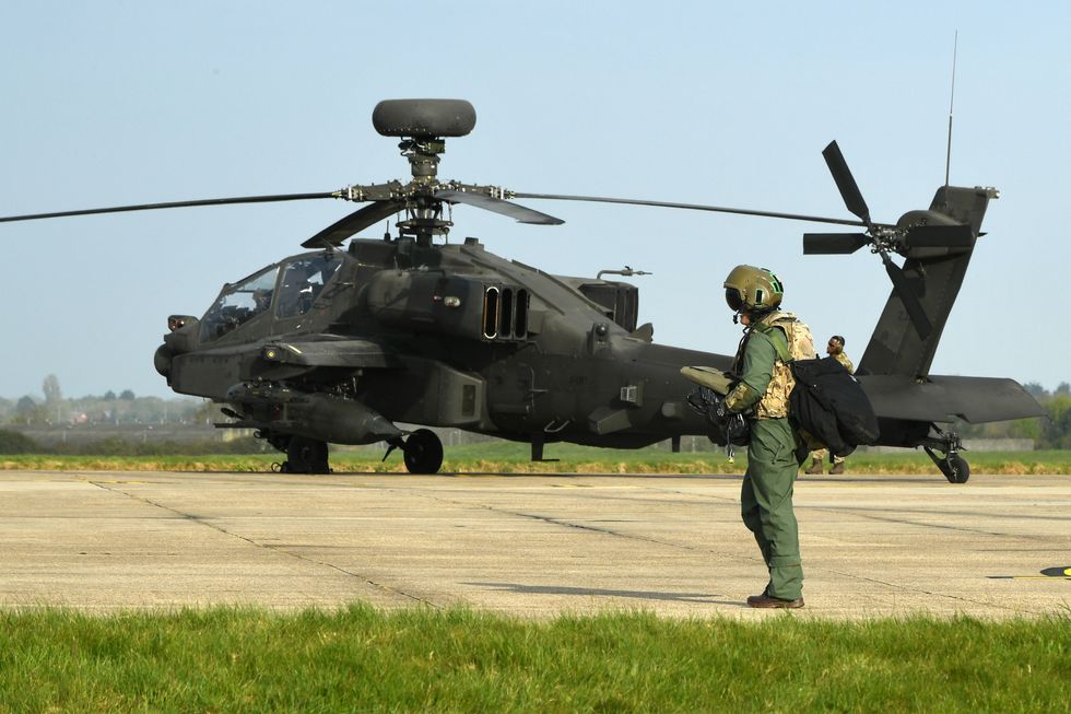 Apache AH-64 British Army attack helicopter, as around 8,000 British Army troops will take part in exercises across eastern Europe to combat Russian aggression in one of the largest deployments since the Cold War.
