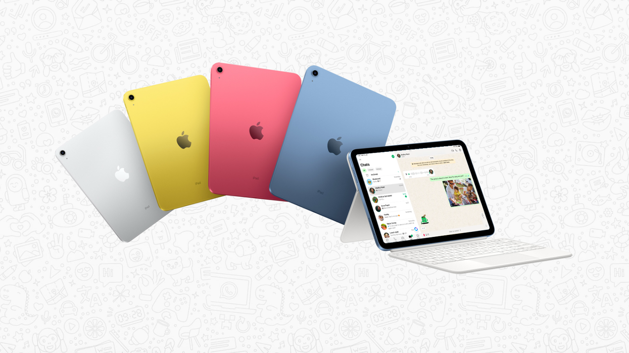apple ipad shown in four colours with the new whatsapp app on screen