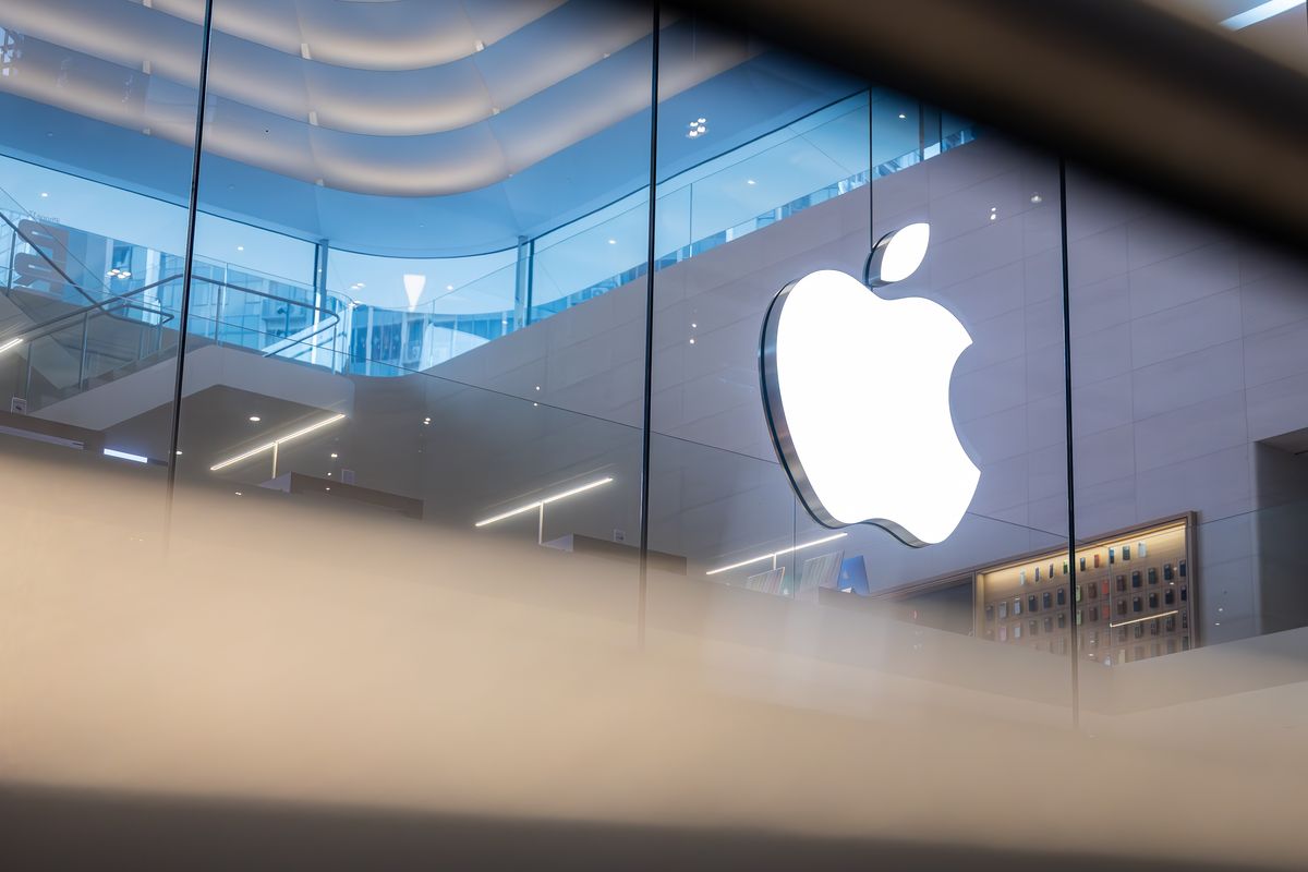 apple logo pictured inside an Apple Store