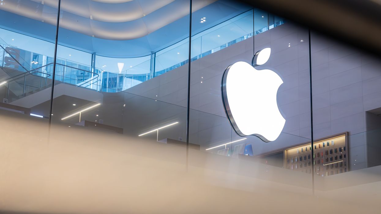 apple logo pictured inside an Apple Store