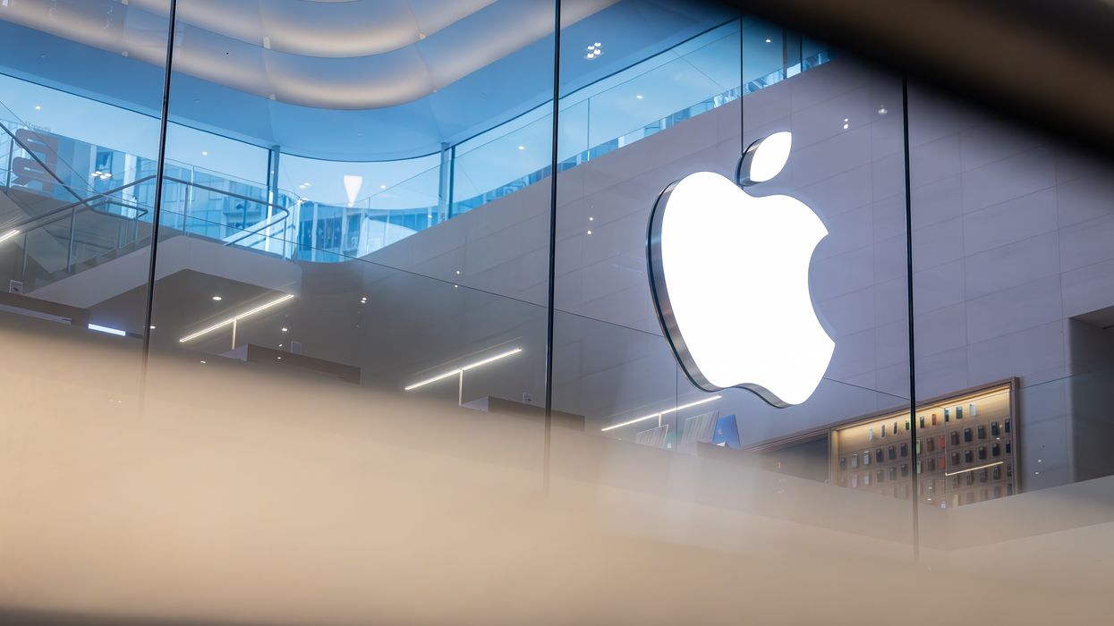 apple logo pictured inside an Apple Store