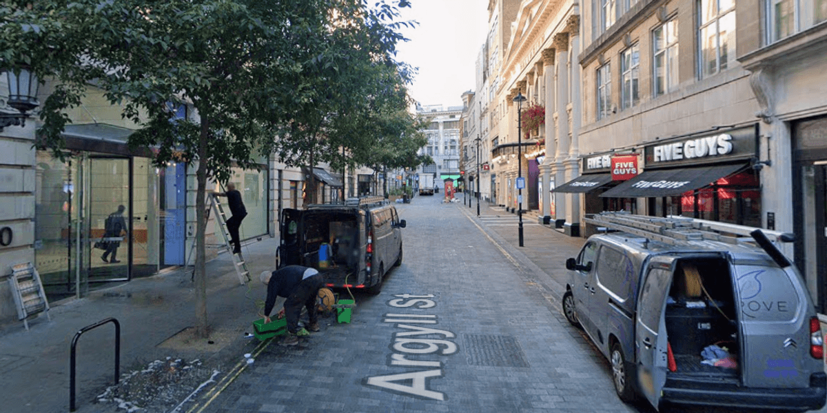 Three people injured after car ploughs into crowds as police arrest woman Three people injured after car ploughs into crowds as police arrest woman