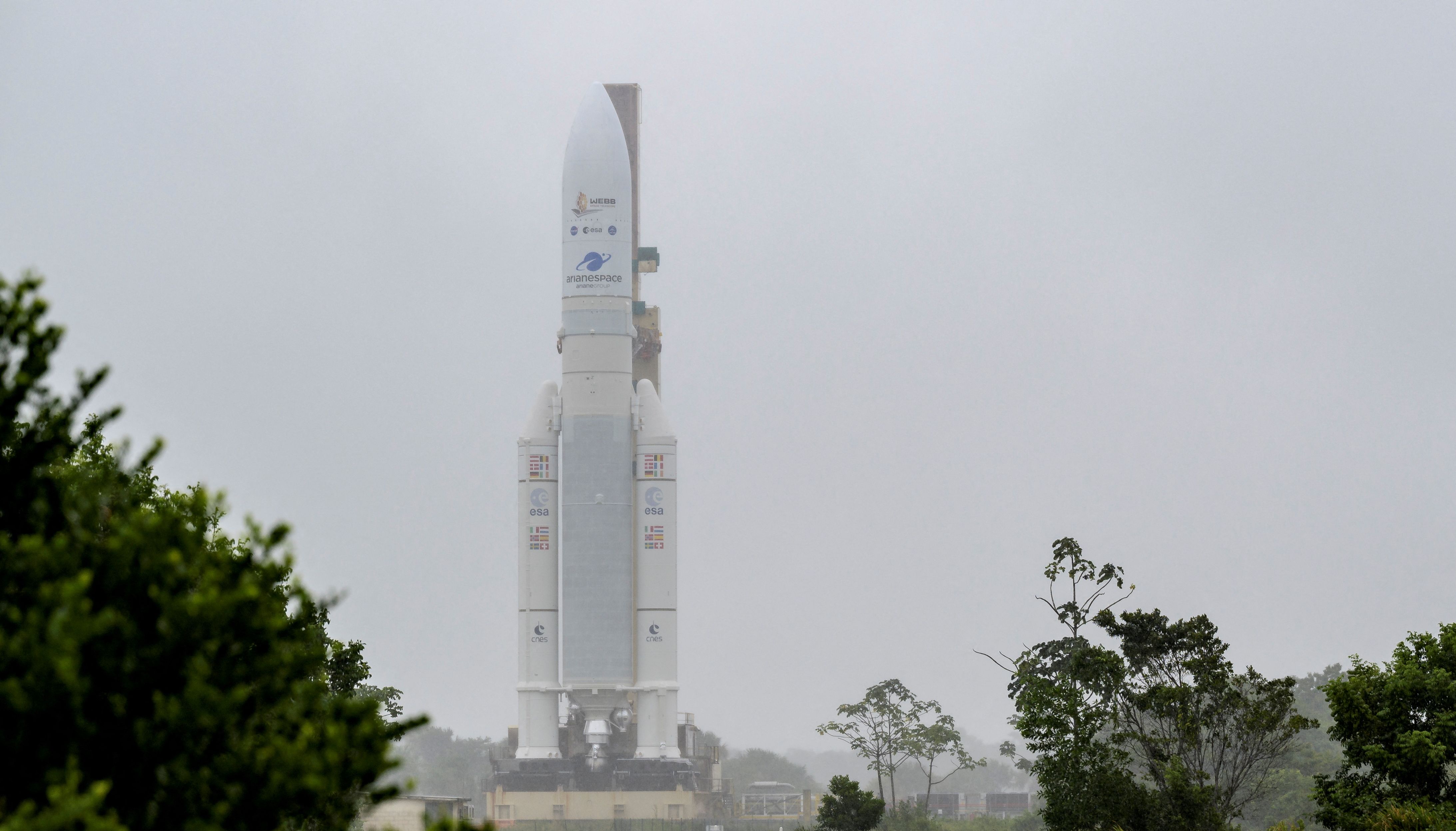 Arianespace's Ariane 5 rocket, with NASA's James Webb Space Telescope onboard, is rolled out to the launch pad at Europe\u2019s Spaceport, the Guiana Space Center in Kourou, French Guiana December 23, 2021. Picture taken December 23, 2021. NASA/Bill Ingalls/Handout via REUTERS. MANDATORY CREDIT. THIS IMAGE HAS BEEN SUPPLIED BY A THIRD PARTY.