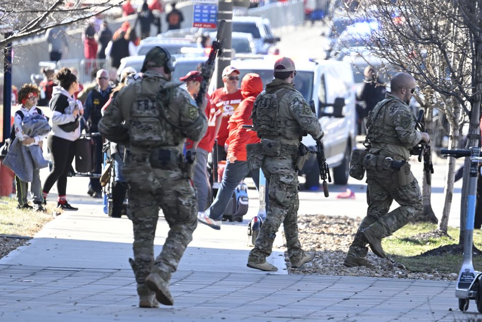 Armed FBI agents attending the scene