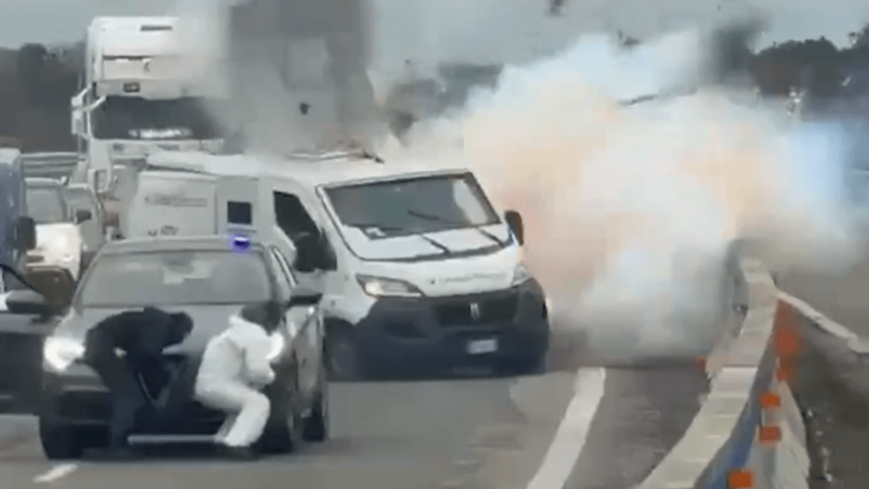armed gang blows up van